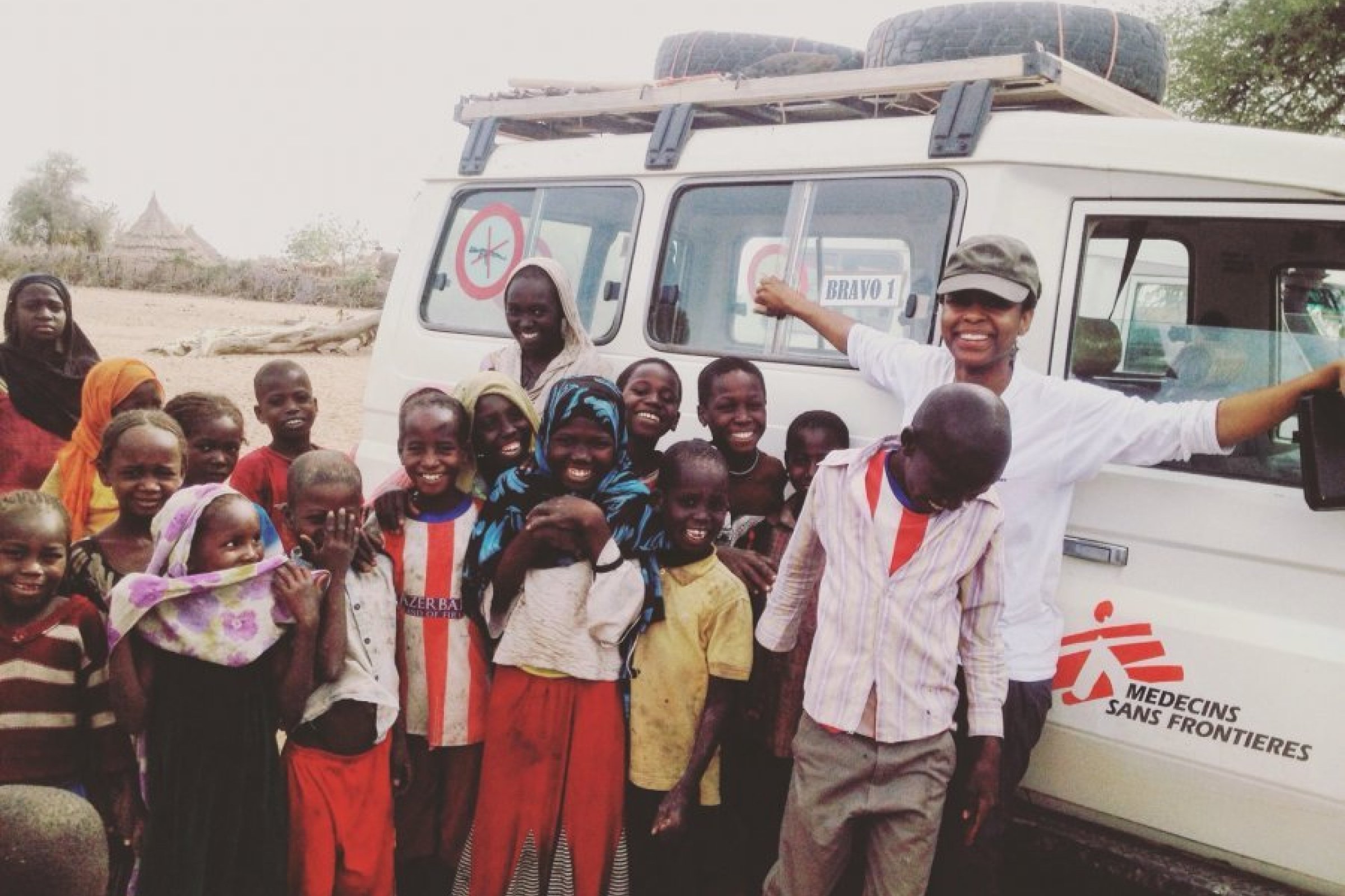 MSF epidemiologist Patricia Ndumbi and local children in Chad